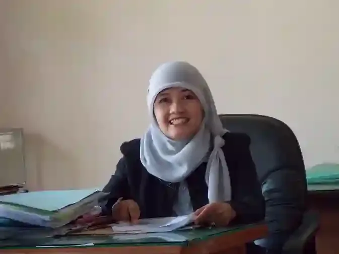 Dra. Enny Andjarwati, M.Pd.